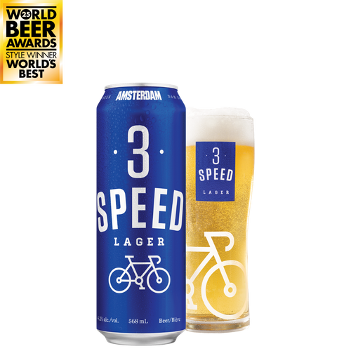 3 Speed Lager can and glass with a 'World Beer Awards Style Winner World's Best' text on a golden background.